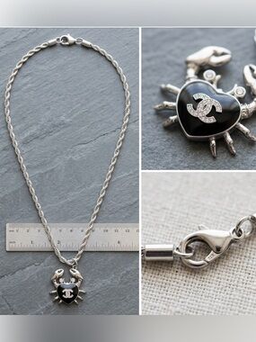 Chanel Silver-Tone stamped 
Crab in black enamel & Chrystal 
on 19" twist rope